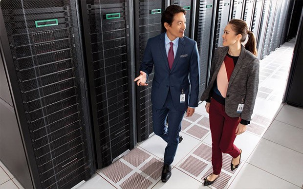 HPE delivers expert services HPE users walking in server room