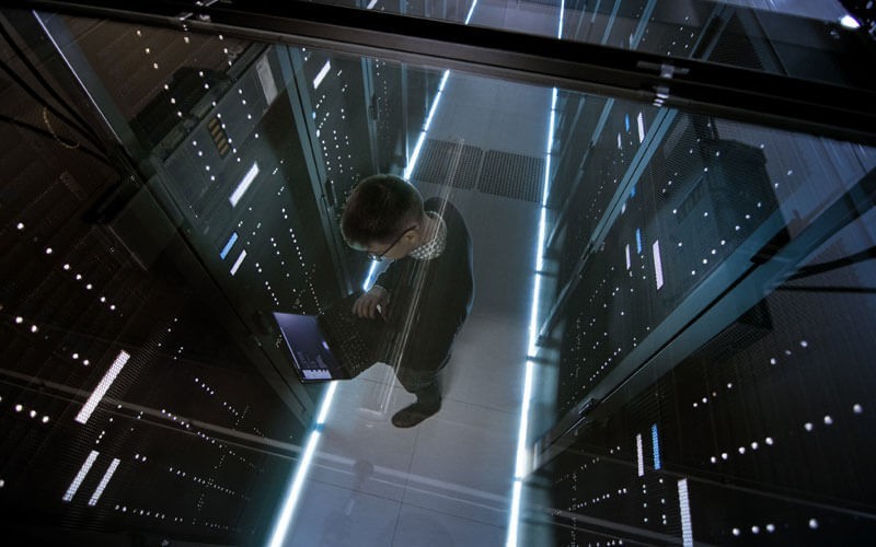 Open up even more possibilities with your data centre Man standing in data centre